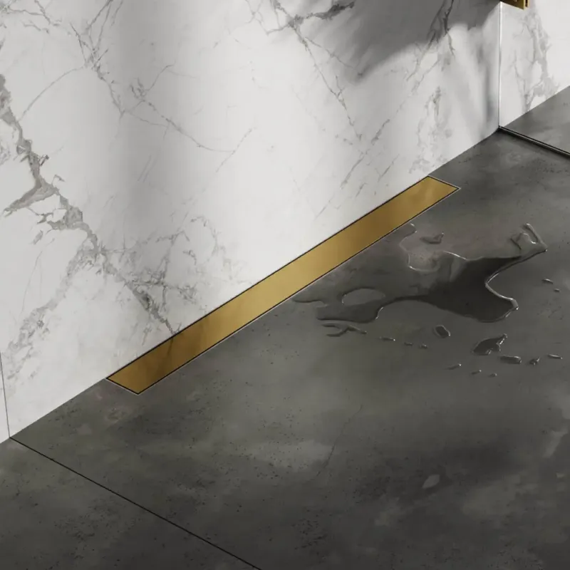 Brauer douchegoot 70x7cm met multifunctioneel rooster en muurflens geborsteld goud PVD Beperkt Aanbod